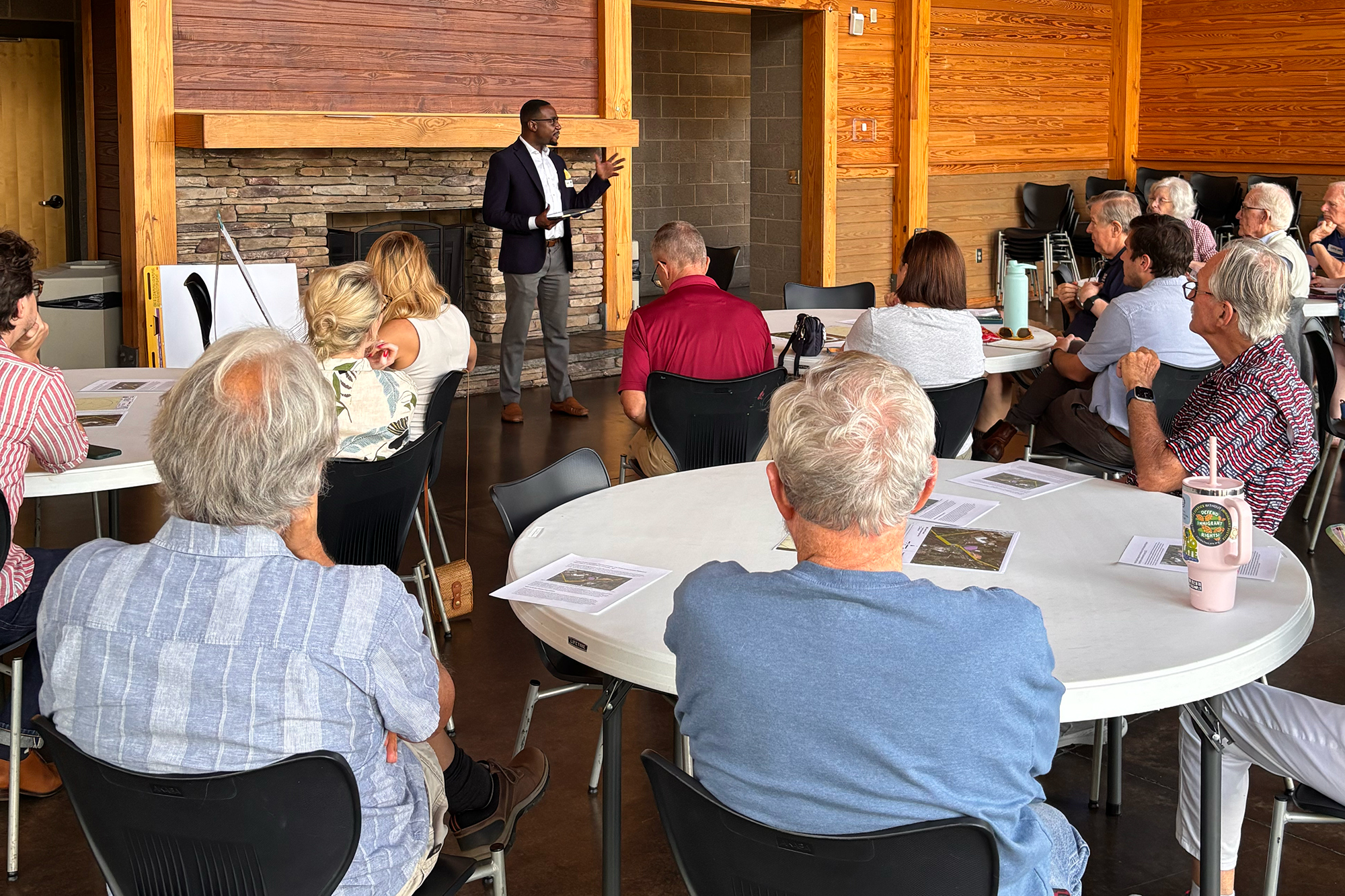Anderson community members listen to State Policy Director Michael Coleman share information about a proposed natural gas plan.