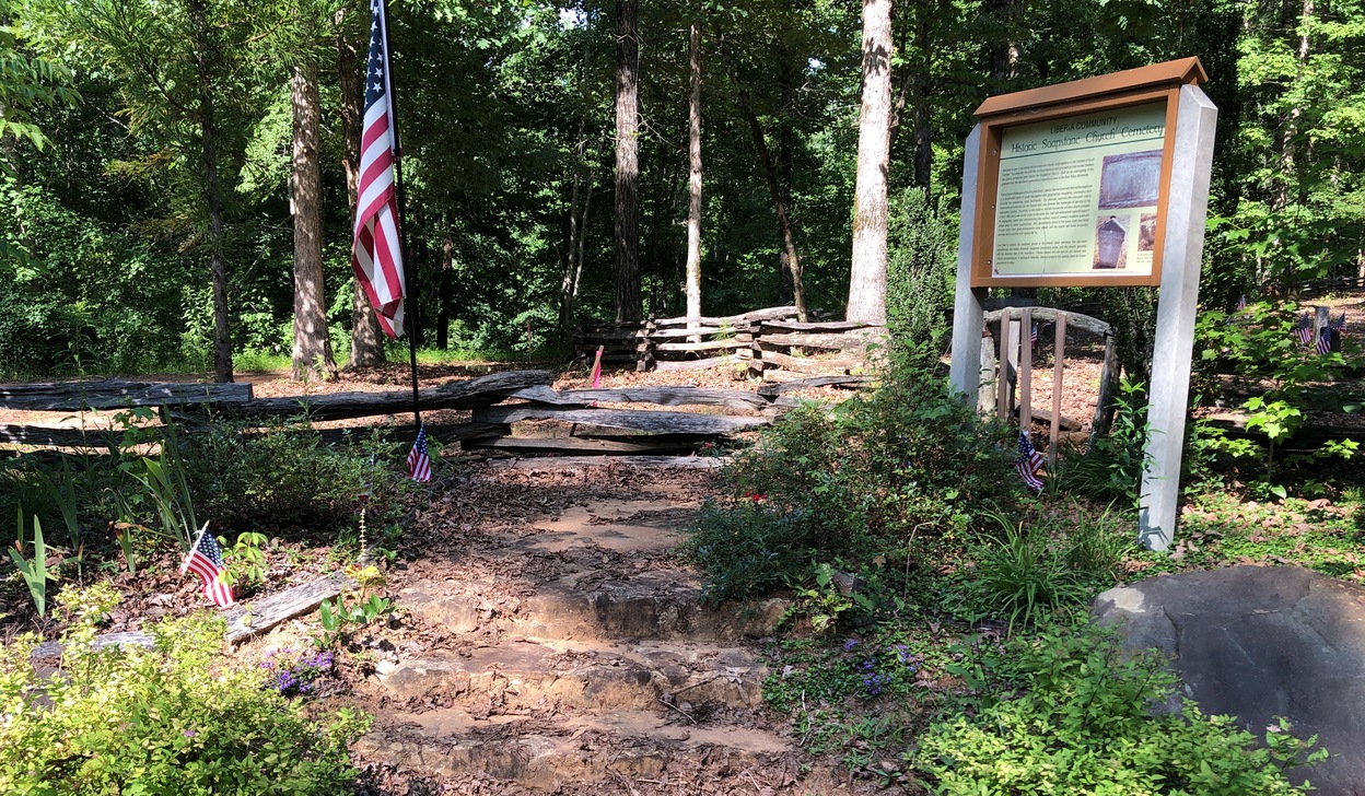 Cemetery entrance with sign